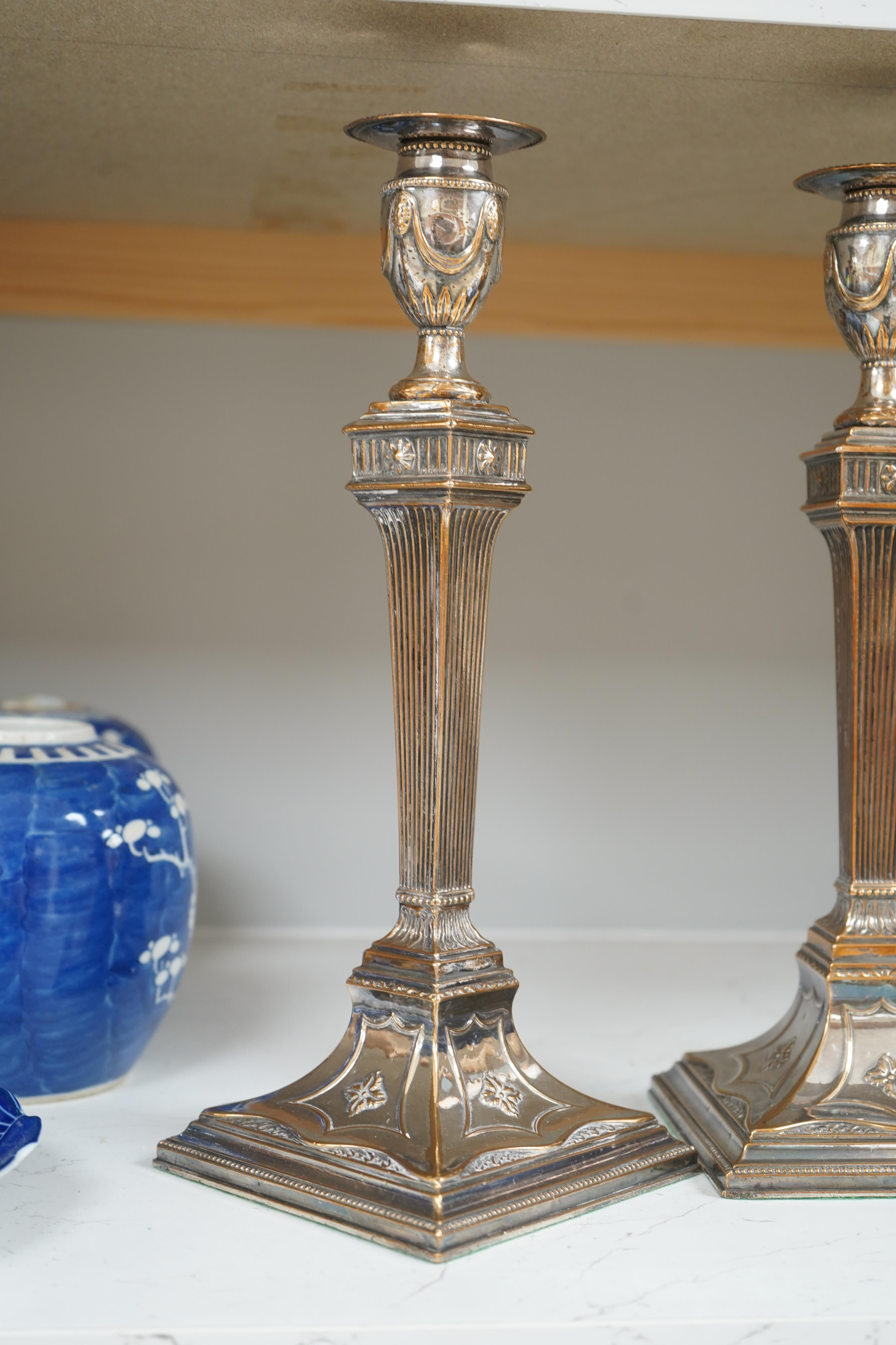 A pair of Adam design silver plated candlesticks, 31.5cm. Condition - worn otherwise good